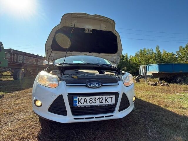 Белый Форд Фокус, объемом двигателя 1.6 л и пробегом 209 тыс. км за 7300 $, фото 1 на Automoto.ua