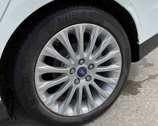 Білий Форд Фокус, об'ємом двигуна 2 л та пробігом 182 тис. км за 9800 $, фото 49 на Automoto.ua