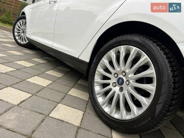 Білий Форд Фокус, об'ємом двигуна 1.6 л та пробігом 211 тис. км за 8750 $, фото 29 на Automoto.ua