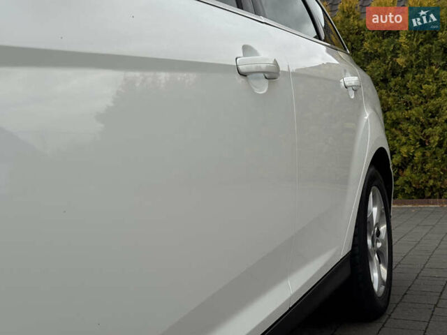 Білий Форд Фокус, об'ємом двигуна 1.6 л та пробігом 221 тис. км за 8699 $, фото 30 на Automoto.ua