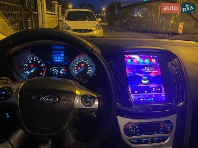 Белый Форд Фокус, объемом двигателя 1 л и пробегом 168 тыс. км за 6900 $, фото 5 на Automoto.ua
