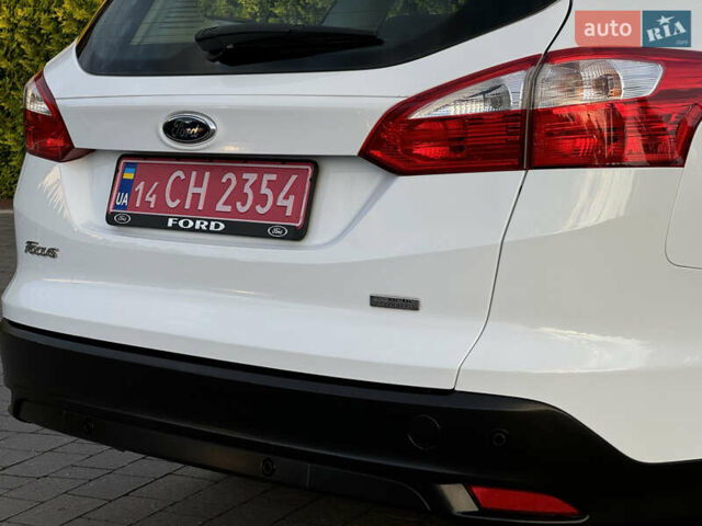 Білий Форд Фокус, об'ємом двигуна 1.6 л та пробігом 212 тис. км за 8799 $, фото 37 на Automoto.ua
