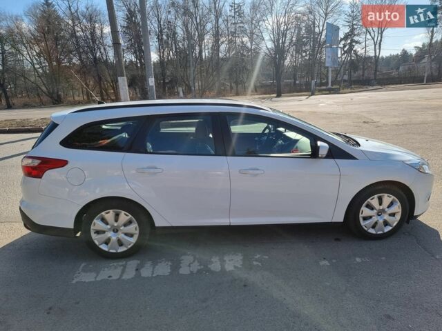 Білий Форд Фокус, об'ємом двигуна 1 л та пробігом 127 тис. км за 7500 $, фото 8 на Automoto.ua