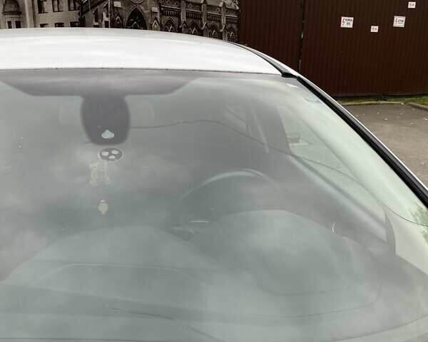 Белый Форд Фокус, объемом двигателя 1.56 л и пробегом 395 тыс. км за 7500 $, фото 1 на Automoto.ua