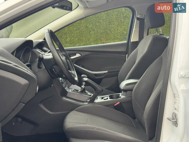 Білий Форд Фокус, об'ємом двигуна 1.6 л та пробігом 221 тис. км за 8699 $, фото 35 на Automoto.ua