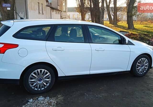 Белый Форд Фокус, объемом двигателя 1.6 л и пробегом 215 тыс. км за 7600 $, фото 21 на Automoto.ua