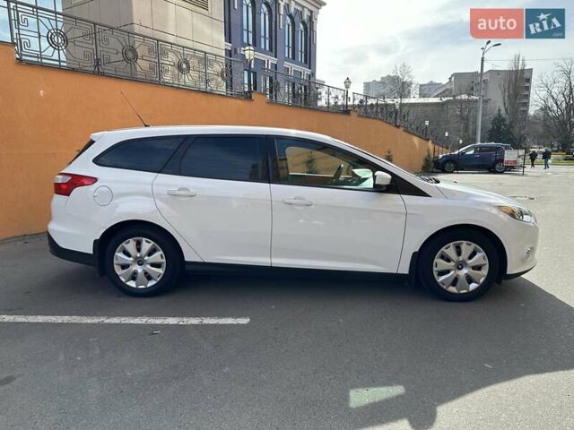Білий Форд Фокус, об'ємом двигуна 1 л та пробігом 252 тис. км за 6200 $, фото 5 на Automoto.ua