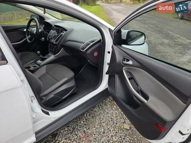 Білий Форд Фокус, об'ємом двигуна 1 л та пробігом 260 тис. км за 6450 $, фото 6 на Automoto.ua