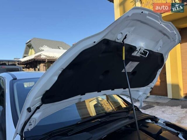 Білий Форд Фокус, об'ємом двигуна 1.6 л та пробігом 241 тис. км за 7950 $, фото 39 на Automoto.ua