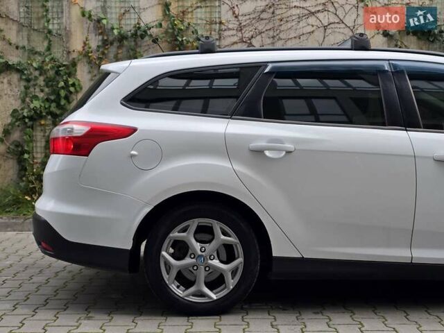 Белый Форд Фокус, объемом двигателя 1 л и пробегом 274 тыс. км за 5899 $, фото 18 на Automoto.ua