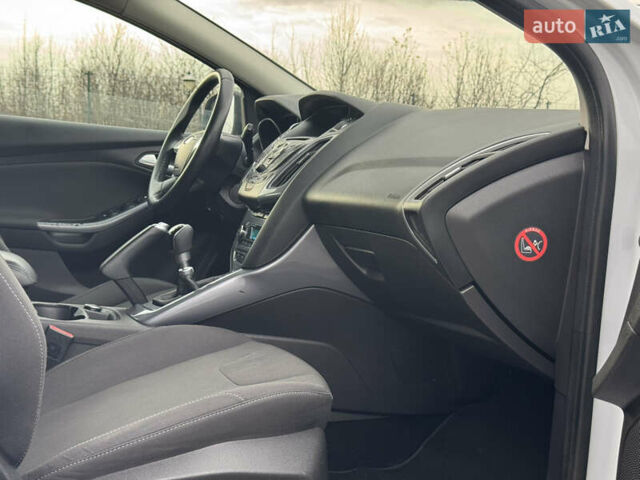 Білий Форд Фокус, об'ємом двигуна 1.6 л та пробігом 221 тис. км за 8699 $, фото 78 на Automoto.ua
