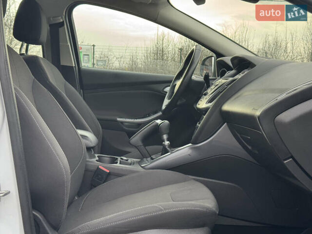 Білий Форд Фокус, об'ємом двигуна 1.6 л та пробігом 221 тис. км за 8699 $, фото 77 на Automoto.ua