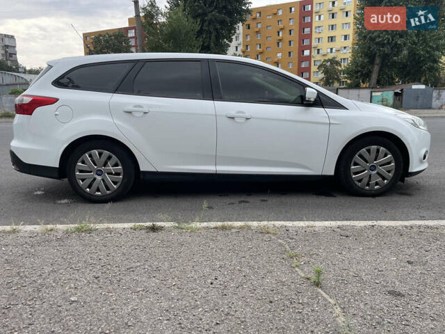 Білий Форд Фокус, об'ємом двигуна 1 л та пробігом 254 тис. км за 7500 $, фото 6 на Automoto.ua