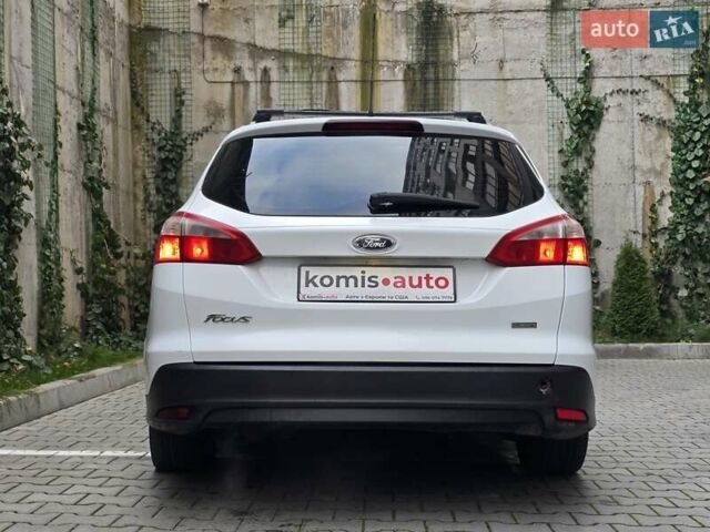Белый Форд Фокус, объемом двигателя 1 л и пробегом 274 тыс. км за 5899 $, фото 12 на Automoto.ua