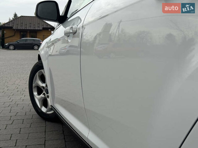 Білий Форд Фокус, об'ємом двигуна 1.6 л та пробігом 221 тис. км за 8699 $, фото 24 на Automoto.ua