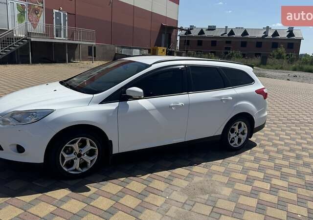 Білий Форд Фокус, об'ємом двигуна 1 л та пробігом 171 тис. км за 8200 $, фото 3 на Automoto.ua