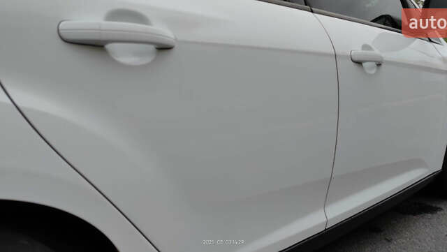 Білий Форд Фокус, об'ємом двигуна 1 л та пробігом 254 тис. км за 7500 $, фото 18 на Automoto.ua