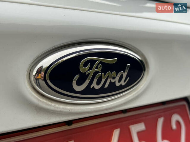 Білий Форд Фокус, об'ємом двигуна 1.6 л та пробігом 221 тис. км за 8699 $, фото 18 на Automoto.ua