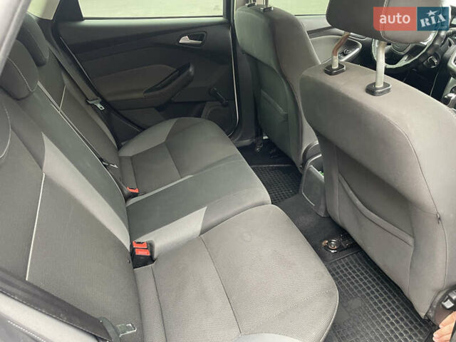 Білий Форд Фокус, об'ємом двигуна 1 л та пробігом 254 тис. км за 7500 $, фото 13 на Automoto.ua
