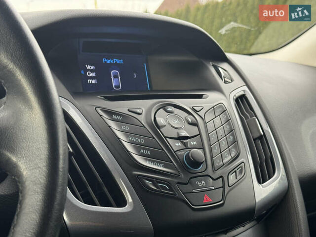 Білий Форд Фокус, об'ємом двигуна 1.6 л та пробігом 221 тис. км за 8699 $, фото 49 на Automoto.ua