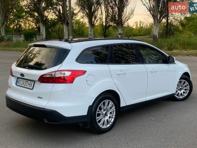 Белый Форд Фокус, объемом двигателя 1 л и пробегом 260 тыс. км за 4990 $, фото 7 на Automoto.ua