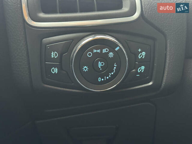 Білий Форд Фокус, об'ємом двигуна 1.6 л та пробігом 221 тис. км за 8699 $, фото 39 на Automoto.ua