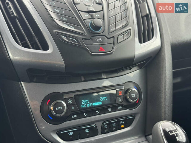 Білий Форд Фокус, об'ємом двигуна 1.6 л та пробігом 221 тис. км за 8699 $, фото 48 на Automoto.ua