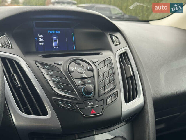 Білий Форд Фокус, об'ємом двигуна 1.6 л та пробігом 221 тис. км за 8699 $, фото 54 на Automoto.ua