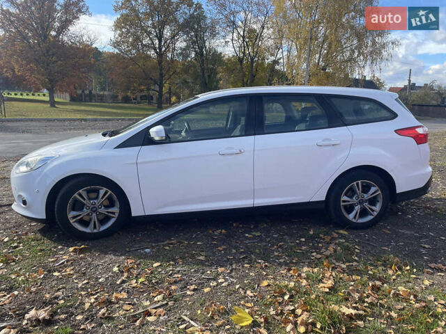 Белый Форд Фокус, объемом двигателя 1.6 л и пробегом 177 тыс. км за 8950 $, фото 3 на Automoto.ua