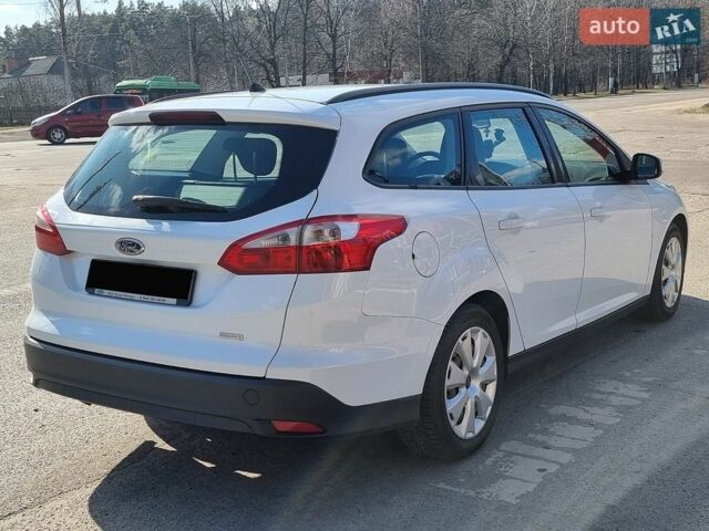 Білий Форд Фокус, об'ємом двигуна 1 л та пробігом 127 тис. км за 7500 $, фото 3 на Automoto.ua