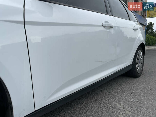 Білий Форд Фокус, об'ємом двигуна 1 л та пробігом 254 тис. км за 7500 $, фото 17 на Automoto.ua