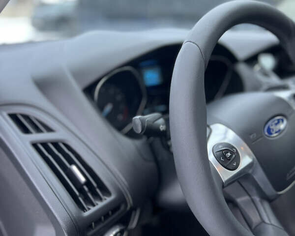 Білий Форд Фокус, об'ємом двигуна 1.6 л та пробігом 174 тис. км за 7950 $, фото 40 на Automoto.ua