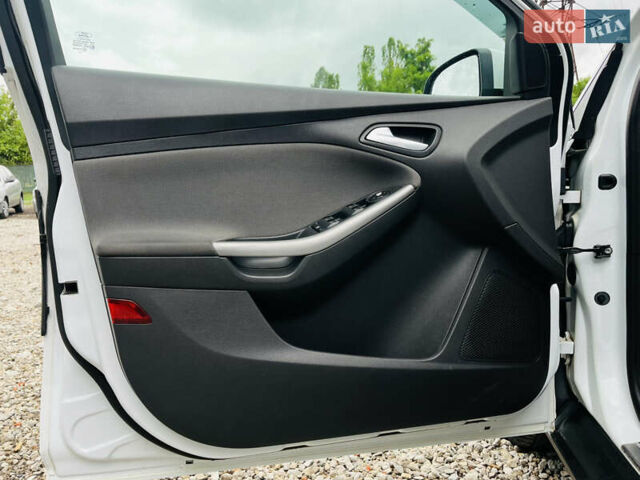 Форд Фокус 2014 в Харькове на Automoto.ua Белый Форд Фокус, объемом двигателя 1.6 л и пробегом 225 тыс. км за 8200 $, фото 10 на Automoto.ua