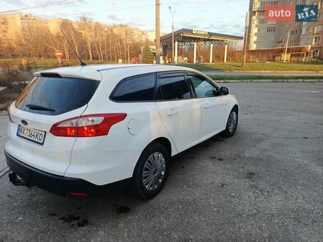 Белый Форд Фокус, объемом двигателя 1.56 л и пробегом 231 тыс. км за 7500 $, фото 5 на Automoto.ua