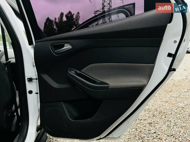 Форд Фокус 2014 в Харькове на Automoto.ua Белый Форд Фокус, объемом двигателя 1.6 л и пробегом 225 тыс. км за 8200 $, фото 17 на Automoto.ua