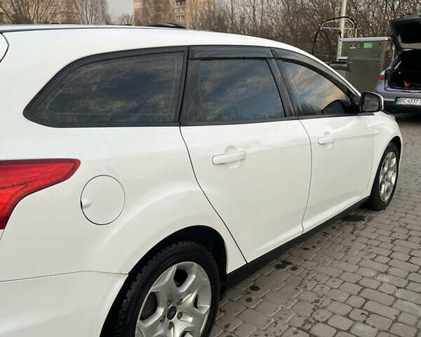 Белый Форд Фокус, объемом двигателя 1.6 л и пробегом 240 тыс. км за 7999 $, фото 7 на Automoto.ua