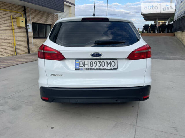 Белый Форд Фокус, объемом двигателя 1.56 л и пробегом 290 тыс. км за 8800 $, фото 16 на Automoto.ua
