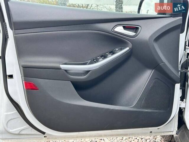 Белый Форд Фокус, объемом двигателя 1 л и пробегом 164 тыс. км за 7700 $, фото 10 на Automoto.ua