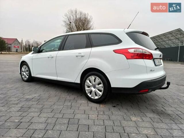 Білий Форд Фокус, об'ємом двигуна 1.6 л та пробігом 230 тис. км за 7377 $, фото 10 на Automoto.ua