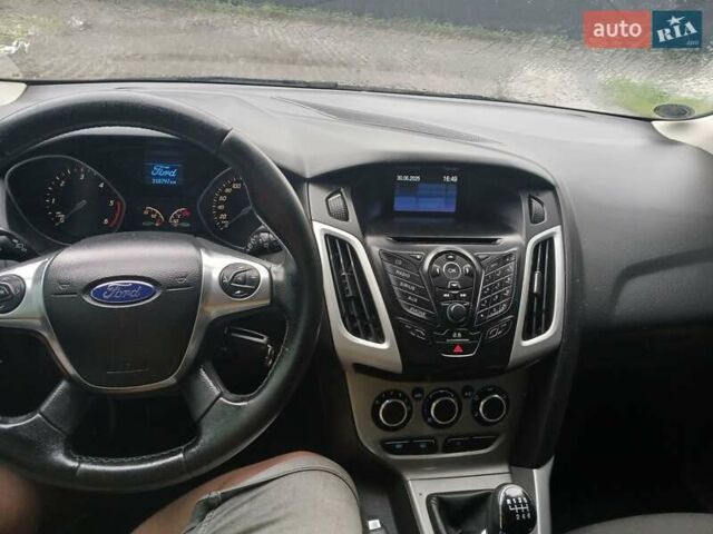 Форд Фокус 2014 в Киеве на Automoto.ua Белый Форд Фокус, объемом двигателя 1.6 л и пробегом 310 тыс. км за 7200 $, фото 11 на Automoto.ua