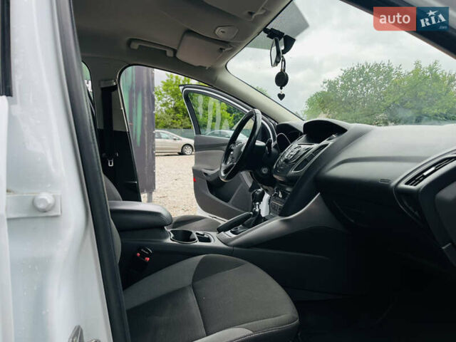 Форд Фокус 2014 в Харькове на Automoto.ua Белый Форд Фокус, объемом двигателя 1.6 л и пробегом 225 тыс. км за 8200 $, фото 18 на Automoto.ua
