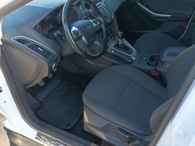 Белый Форд Фокус, объемом двигателя 1 л и пробегом 168 тыс. км за 6500 $, фото 8 на Automoto.ua