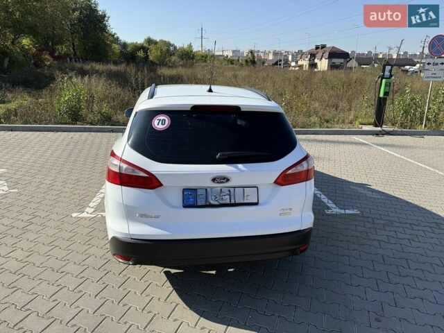 Білий Форд Фокус, об'ємом двигуна 1 л та пробігом 199 тис. км за 5500 $, фото 6 на Automoto.ua
