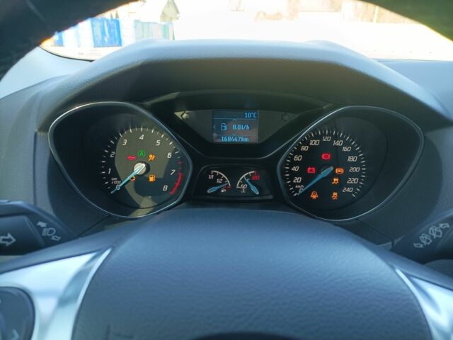 Белый Форд Фокус, объемом двигателя 1 л и пробегом 168 тыс. км за 6500 $, фото 16 на Automoto.ua