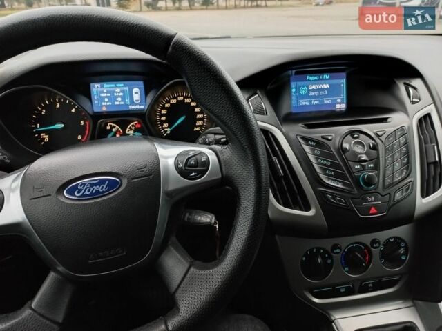 Белый Форд Фокус, объемом двигателя 1.6 л и пробегом 235 тыс. км за 7777 $, фото 31 на Automoto.ua