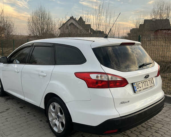 Белый Форд Фокус, объемом двигателя 1.6 л и пробегом 240 тыс. км за 7999 $, фото 5 на Automoto.ua