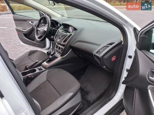 Білий Форд Фокус, об'ємом двигуна 1.6 л та пробігом 230 тис. км за 7377 $, фото 27 на Automoto.ua