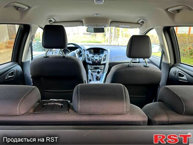 Белый Форд Фокус, объемом двигателя 1 л и пробегом 164 тыс. км за 7600 $, фото 4 на Automoto.ua