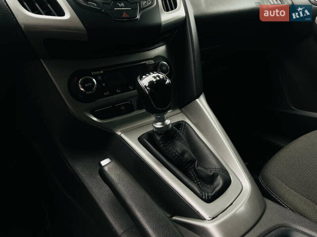 Форд Фокус 2014 в Харькове на Automoto.ua Белый Форд Фокус, объемом двигателя 1.6 л и пробегом 225 тыс. км за 8200 $, фото 24 на Automoto.ua