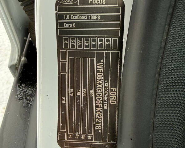 Белый Форд Фокус, объемом двигателя 1 л и пробегом 251 тыс. км за 7400 $, фото 41 на Automoto.ua